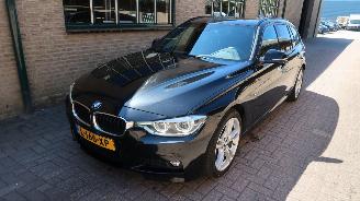 damaged passenger cars BMW 3-serie BMW 3-serie Touring 320i Edition M Sport Shadow High Executive 2018/4