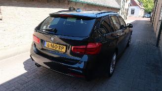 BMW 3-serie BMW 3-serie Touring 320i Edition M Sport Shadow High Executive picture 6