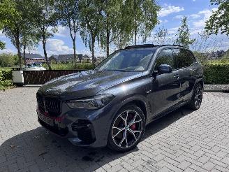 Schadeauto BMW X5 BMW X5 xDrive 45e MSport PANO Sport Stoelen Trekhaak Laser light 360view VOL 2022/1