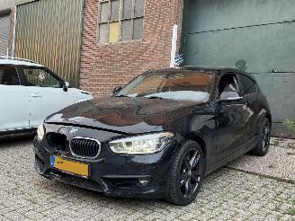 Coche accidentado BMW 1-serie 118i Executive automaat KM NAP 2018/2