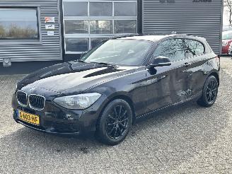 Schadeauto BMW 1-serie 114i 3drs 2013/12