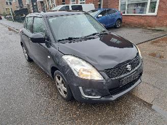 Vaurioauto  passenger cars Suzuki Swift 1.2i comfort eass 2016/2
