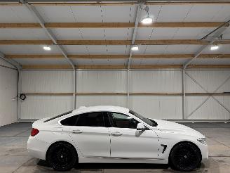 Schadeauto BMW 4-serie 418i 100kW Automaat Centennial High Executive 2017/1