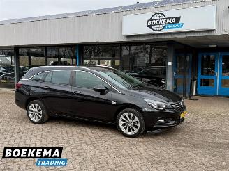 skadebil auto Opel Astra Sports Tourer 1.0 Edition Automaat Navigatie Clima Cruise PDC 2016/7