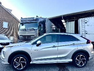skadebil auto Mitsubishi Eclipse Cross 2.4 PHEV Plug-In Hybr aut 4WD Exec - nap - 1e eig - xenon - 360cam - front + line + side assist - stuurverw 2023/3