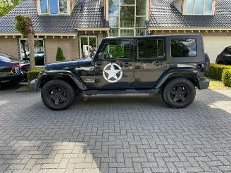 krockskadad bil auto Jeep Wrangler Unlimited 2.8 CRD SAHARA 2010/1